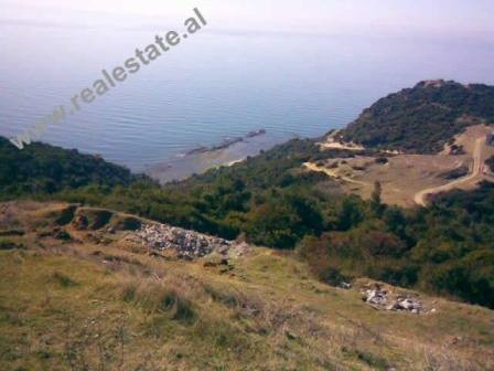 Land for sale in Lalzit Bay. The land lies in a hilly area, about 300m away from the beach. It has a