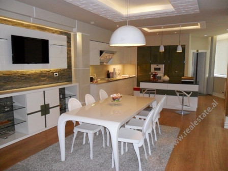 Duplex apartment for rent in Bajram Curri Boulevard in Tirana. It is situated on the last two floors